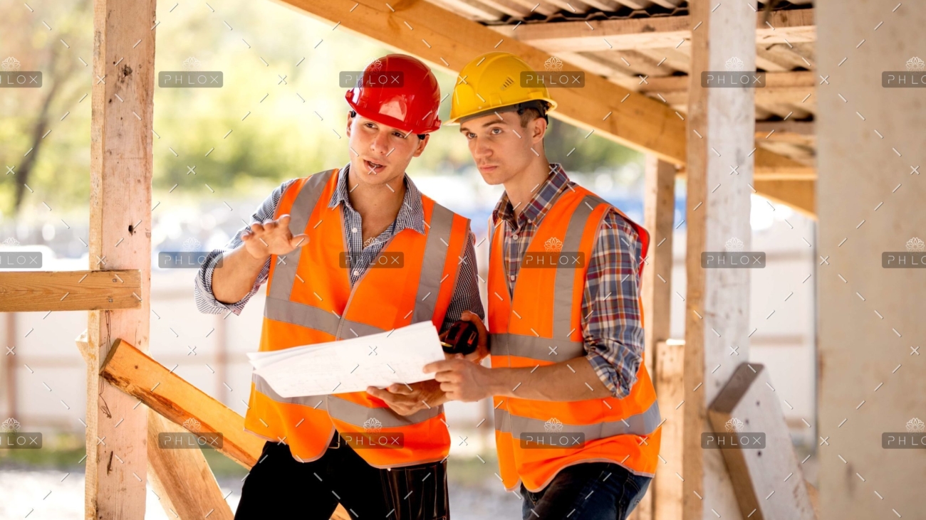 demo-attachment-136-op_two-men-dressed-in-shirts-orange-work-vests-and-KE9JMU2-scaled